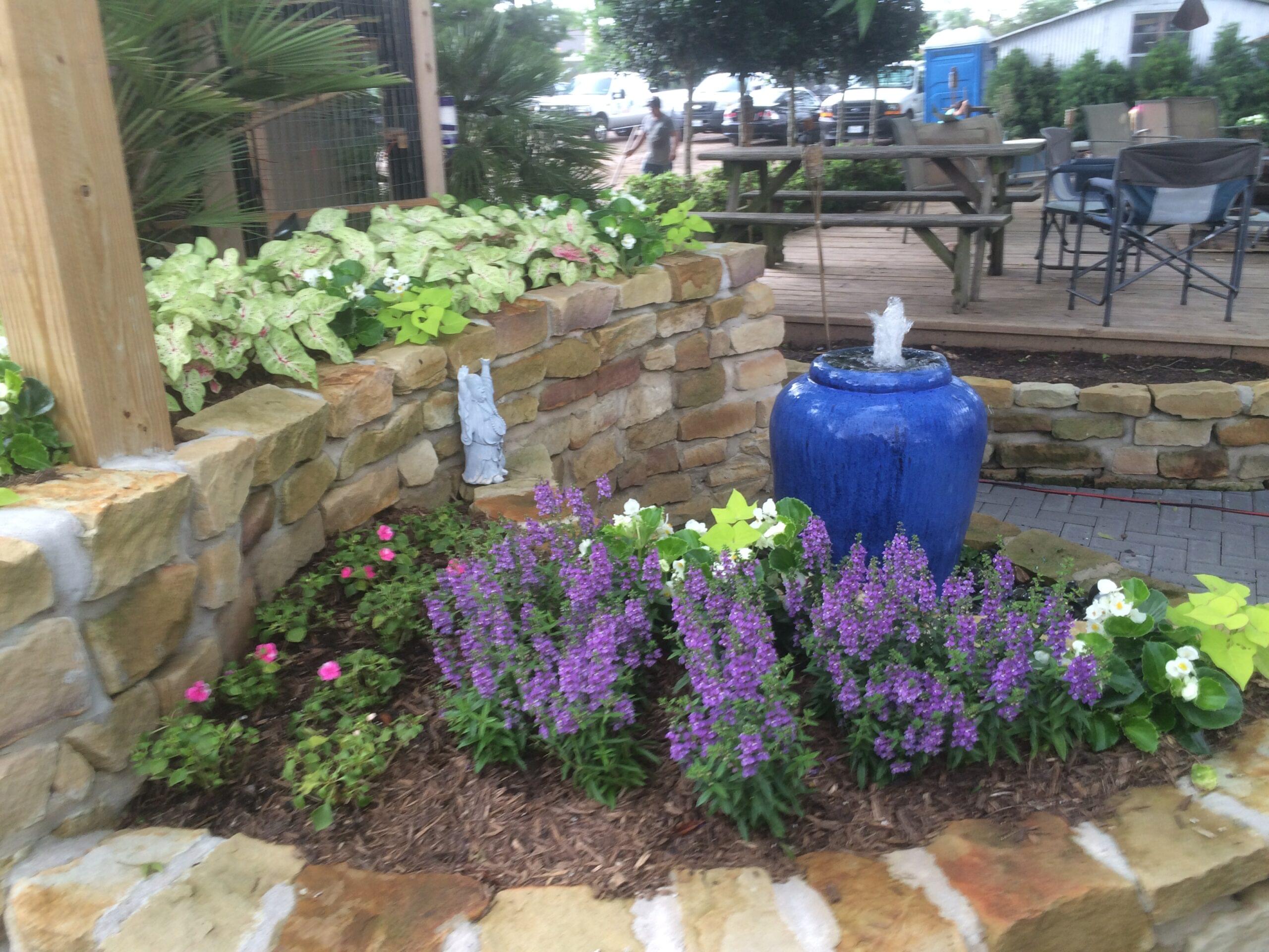 Safari Landscapes, landscaping, grass cutting, tree trimming, Irrigation System Services, Landscape Design, lawn care, irrigation system installation, seasonal flower planting, expert landscaping solutions